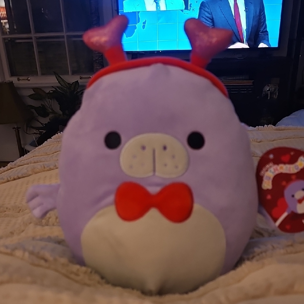 Squishmallows Purple Manatee with Red Bow